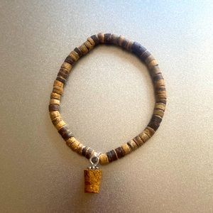 High quality unisex wood bracelet w/ wooden charm.
